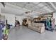 The spacious garage features ample storage space and room for multiple golf carts at 1367 Honea Path, The Villages, FL 32162