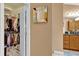 Walk-in closet with ample storage and organization system at 1367 Honea Path, The Villages, FL 32162
