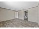 Bright bedroom features a walk-in closet and an en-suite bathroom at 147 Woodstork Way, Frostproof, FL 33843