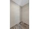 Bedroom closet with a built-in wire rack at 147 Woodstork Way, Frostproof, FL 33843