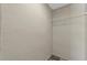 Bedroom closet with a built-in wire rack for storage at 147 Woodstork Way, Frostproof, FL 33843