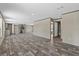 Large open-concept living area with modern kitchen and visible natural light at 147 Woodstork Way, Frostproof, FL 33843
