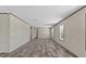 Spacious living room features modern floors and plenty of natural light at 147 Woodstork Way, Frostproof, FL 33843