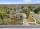 This house is in a mature neighborhood, with tree lined streets and sidewalks at 1602 Oak Hollow Rd, Clermont, FL 34711