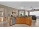 Spacious kitchen with granite countertops, stainless steel appliances, and ample cabinet space at 1602 Oak Hollow Rd, Clermont, FL 34711