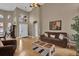 Spacious living room featuring high ceilings, hardwood floors, and abundant natural light at 1602 Oak Hollow Rd, Clermont, FL 34711