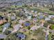 Spacious single-story home in a community near a lush green golf course and shimmering lake at 17694 Se 88Th Covington Cir, The Villages, FL 32162