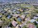 Aerial view of the property with boundary line in a golf community at 17694 Se 88Th Covington Cir, The Villages, FL 32162