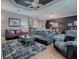 Spacious living room with hardwood floors, a ceiling fan and a view of dining room at 17694 Se 88Th Covington Cir, The Villages, FL 32162