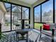 Patio with views of the backyard, table, bar stools, and outdoor seating at 17694 Se 88Th Covington Cir, The Villages, FL 32162