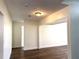 Well-lit living room with smooth walls and contemporary lighting at 18203 Sandalwood Dr # 18203, Wildwood, FL 34785