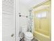 Full bathroom featuring a toilet, and a shower with vintage hardware at 2 Heather Ln, Fruitland Park, FL 34731