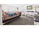 Comfortable bedroom with white walls and a bed dressed with patriotic-themed bedding at 2 Heather Ln, Fruitland Park, FL 34731