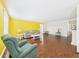 Inviting living room featuring hardwood floors, comfortable seating, a decorative fireplace, and lots of natural light at 2 Heather Ln, Fruitland Park, FL 34731