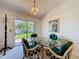 Cozy dining area with sliding doors to the yard, providing natural light and easy outdoor access at 2065 Braxton St, Clermont, FL 34711