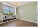 This bedroom features a built in bay window with drawers, cabinets, and a bench at 22027 Belgian Ct, Mount Dora, FL 32757