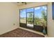 This is a view of the lanai with a screen and a beautiful view of the surrounding yard at 22027 Belgian Ct, Mount Dora, FL 32757