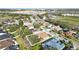 A stunning aerial view of the property showcasing its location within a vibrant neighborhood at 2471 Holly Berry Cir, Clermont, FL 34711