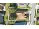 An overhead aerial view of the property showing its well-maintained roof and surroundings at 2471 Holly Berry Cir, Clermont, FL 34711