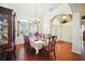 Elegant dining room with a chandelier and formal dining set at 2471 Holly Berry Cir, Clermont, FL 34711