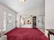 Open foyer with large windows and decorative touches providing ample natural light at 25013 Adair Ave, Sorrento, FL 32776
