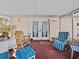 Patio featuring furniture and french doors leading to the backyard at 25013 Adair Ave, Sorrento, FL 32776