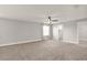 Spacious main bedroom featuring neutral carpet, natural light, and ensuite access at 2505 Civitas Pl, Casselberry, FL 32707