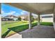 Covered patio featuring brick pavers and overlooking the well-maintained backyard at 2505 Civitas Pl, Casselberry, FL 32707