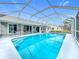 Beautiful pool, with a screened-in lanai, set against picturesque surroundings at 25110 Meriweather Rd, Leesburg, FL 34748