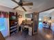 This is a home office with a desk and natural light coming from the window at 25447 Belle Alliance, Leesburg, FL 34748