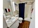 Functional bathroom with a shower, vanity, and wood-look flooring at 2910 Barboza Dr, The Villages, FL 32162