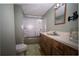 Bathroom featuring a vanity and a shower over tub at 2930 Cr 416N, Lake Panasoffkee, FL 33538