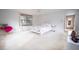 Bright bedroom with a queen-size bed at 2930 Cr 416N, Lake Panasoffkee, FL 33538
