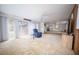 Bright, spacious living room featuring a large window and comfortable seating area at 2930 Cr 416N, Lake Panasoffkee, FL 33538