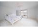 Bright main bedroom with a ceiling fan and a window seat at 2930 Cr 416N, Lake Panasoffkee, FL 33538