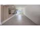 Clean and organized garage space with ample shelving for storage, perfect for keeping your belongings tidy at 30342 Gidran Ter, Mount Dora, FL 32757