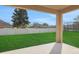 Outdoor patio area with a view of the fenced backyard at 30342 Gidran Ter, Mount Dora, FL 32757