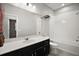 Bathroom featuring a shower and tub combo with a large vanity at 3139 Hurston Watch Ln, Clermont, FL 34711