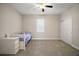Bedroom featuring a closet, ceiling fan, and bright window at 3139 Hurston Watch Ln, Clermont, FL 34711