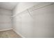 Walk-in closet with carpeted floors and wire shelving for storage at 3139 Hurston Watch Ln, Clermont, FL 34711