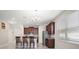 Open-concept kitchen featuring a large island, stainless steel appliances and a breakfast bar at 3139 Hurston Watch Ln, Clermont, FL 34711