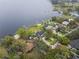 Aerial view of the lake community featuring numerous private docks at 31400 Saunders Dr, Tavares, FL 32778