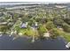 Overhead view of neighborhood, showing the proximity to the lake at 31400 Saunders Dr, Tavares, FL 32778