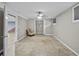Bedroom featuring tile floors, light paint, a closet and ceiling fan at 31400 Saunders Dr, Tavares, FL 32778