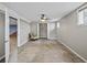 Bedroom featuring tile floors, light paint, a closet and ceiling fan at 31400 Saunders Dr, Tavares, FL 32778