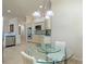 Modern kitchen with stainless steel appliances, breakfast nook, and ample counter space for meal preparation at 3144 Mayflower Loop, The Villages, FL 32163