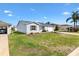 Charming single-story home with well-maintained lawn and manicured landscaping at 3349 Ashbrook Pl, The Villages, FL 32162