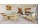 Outdoor patio features comfortable seating and scenic views of the property at 3349 Ashbrook Pl, The Villages, FL 32162