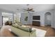 Spacious living area with open floor plan and seamless flow from the dining room at 3430 Turningwind Ln, Winter Garden, FL 34787