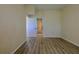 Bedroom with wood floors, neutral walls, and natural light at 39100 Tacoma Dr, Lady Lake, FL 32159